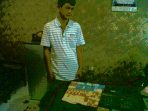wpid-Tsk-saryadi-dengan-Barang-Bukti-BB-uangbuku-rekapan-togel-dan-dua-kolkulator-saat-diamankan-dipolres-mUra.